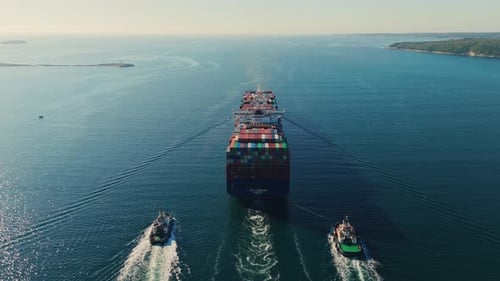 Tugboats Escort Freight Ship From Halifax Canada View From Above