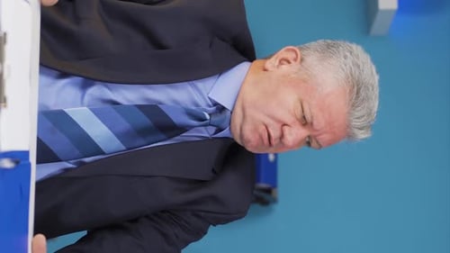 Adult Man Working in Corporate Office Environment
