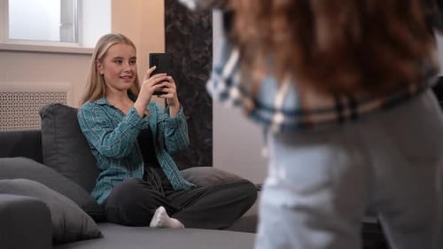 Young Adults Friends Together Using Cell Phone