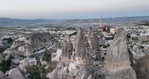 Aerial View of Natural Rock Formations in the Sunset Valley with Cave Houses in Cappadocia Turkey