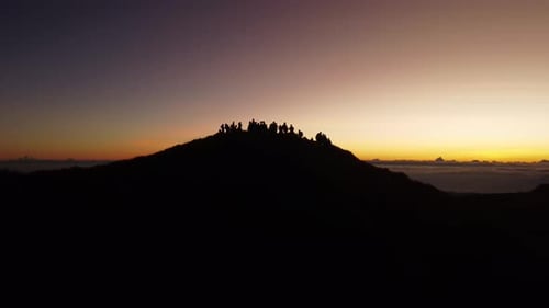 Aerial video of Mount Pulag at sunset with people in the background, the third highest mountain