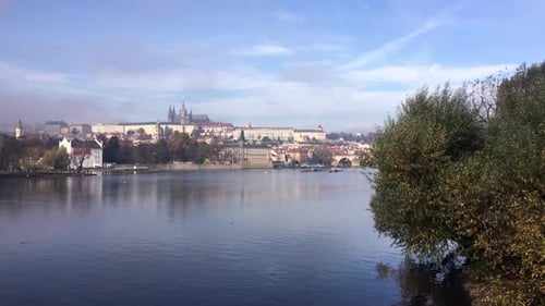 Landscape of Prague city, Prague castle and Vltava river in hazy autumn morning