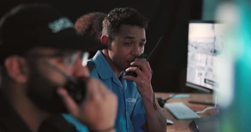 Security guard, man and communication with radio in office for surveillance