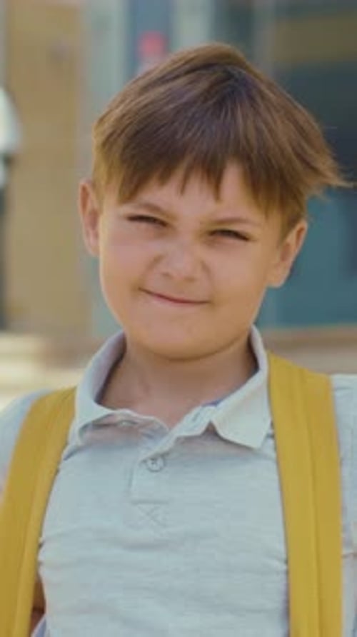 Smiling Boy Wearing a Backpack Portrait