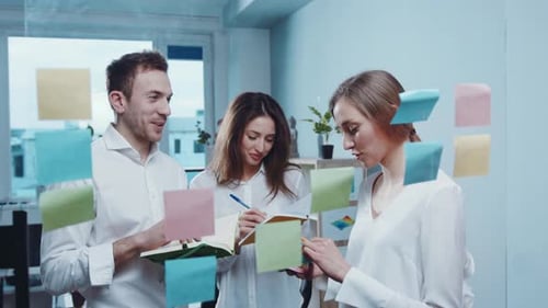 Team Working Together on Sticky Note Project