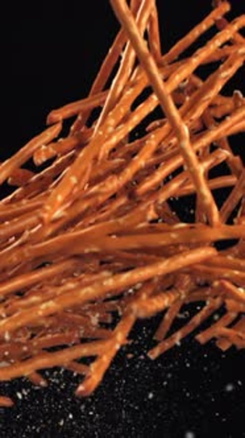 Salted Cracker Sticks Fly and Fall Filmed on a Highspeed Camera at 1000 Fps