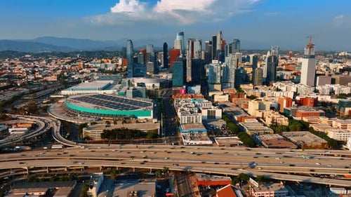 Cars run by the highways circling around downtown of Los Angeles, California, USA.