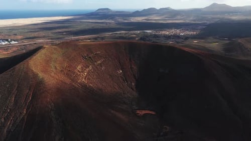 Aerial Sweep Over Volcanic Crater and Corralejo Dunes Fuerteventura