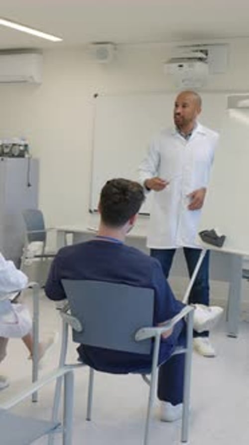 Medical Professional Giving Presentation to Students