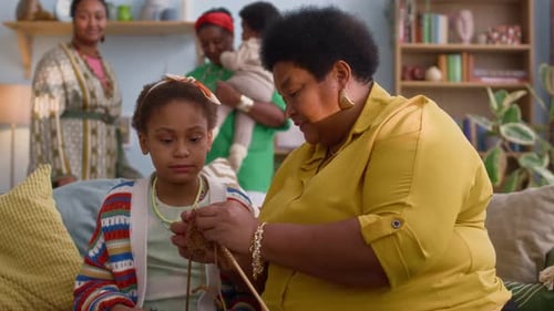 Family Knitting Together at Home