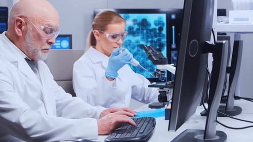 Scientists Working in Modern Medical Research Laboratory