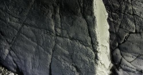 Textures and Patterns of Natural Rock Formations in a Serene Outdoor Setting