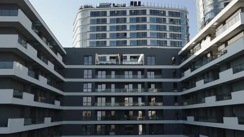 Facade of Modern Comfortable Residential Building in Shade in Sunny Weather