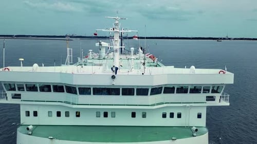 Unique aerial shot of a ferry boat sailing towards the camera.