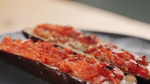 Grilled Italian Eggplant Stuffed with Tomatoes Nuts Pomegranate and Garlic and Olive Oil Middle