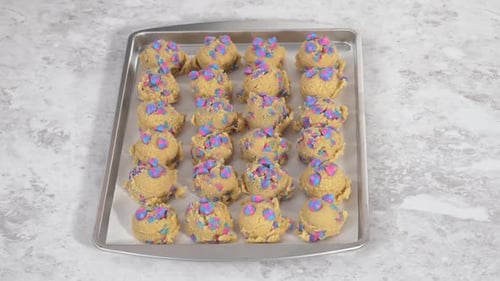 Chilled Cookie Dough Scoops on the Baking Sheet to Bake Unicorn Chocolate Chip Cookies