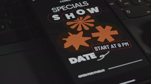 Smartphone Ad for Comedy Show on Laptop