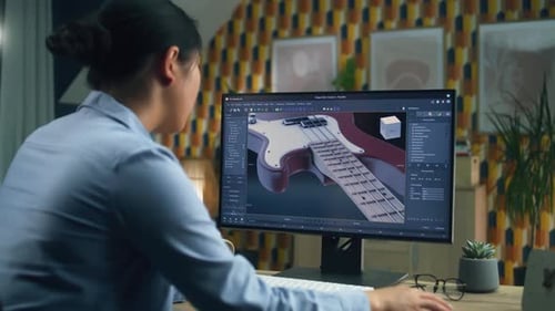 Woman Designing 3D Prototype of Guitar
