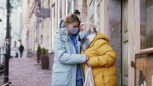 Woman visits senior in city, waves goodbye