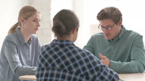 Business Team Having Discussion in Office