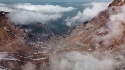 Aerial of Snowy Mountain Range with Snow