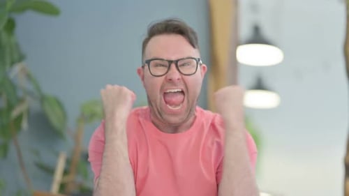 Man Celebrating Success with Joyful Expression