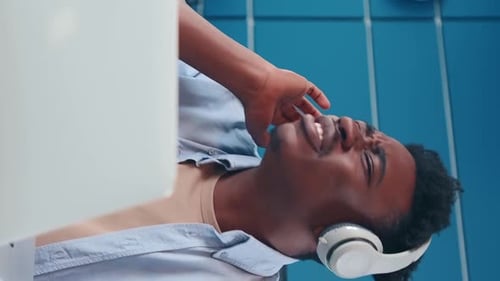 Overcoming Frustration While Working on a Laptop in a Modern Office