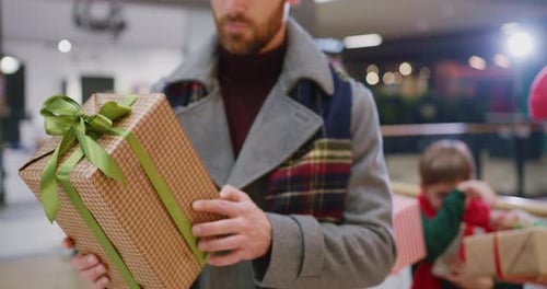 Family Holiday Shopping with Gifts at Mall