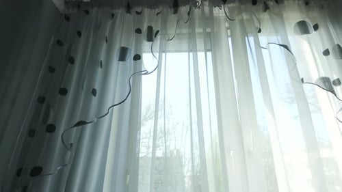 Transparent White Curtain Tulle Moves From Wind From An Open Window. Sunny Day Video