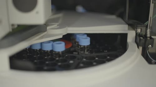 Automated Laboratory Machine with Medical Vials