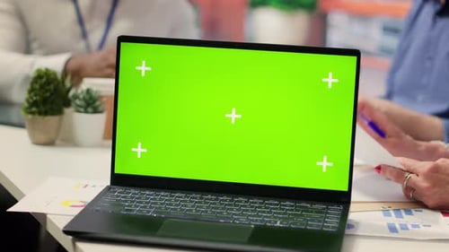 Laptop With Chroma Key in Office Setting