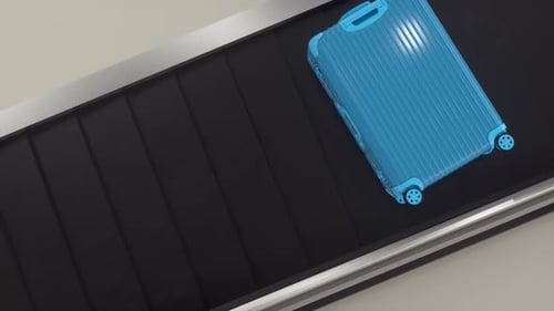 Luggage's moving on Airport Conveyor Belt, overhead view. Suitcases of different colors