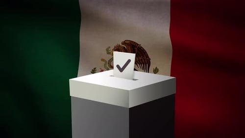 Casting vote into the ballot box during Mexico election