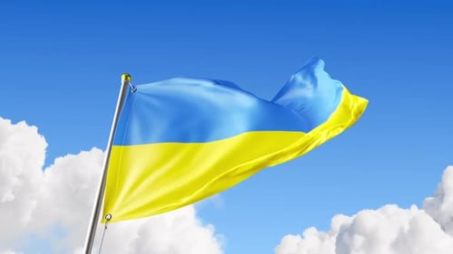 Flag of Ukraine Waving Against Blue Sky and White Clouds