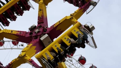 Antalya Turkey CIRCA 2022 Large Extreme Carousel Pendulum with Lot of Campers Work in Amusement Park