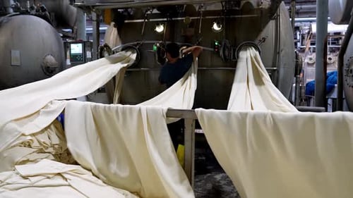 Human Labor in Textile Fabric Processing at Factory