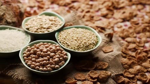 Bowls of Various Grains on Table