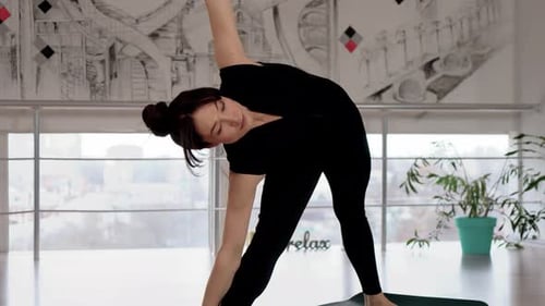 Woman Practice Yoga Poses in Bright Studio Fitness and Healthy Lifestyle Concept Female Making