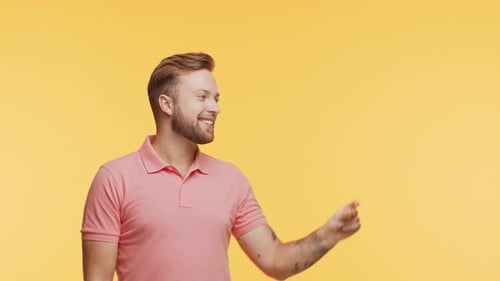 Expressive Young Man Over Vibrant Background Studio Portrait of Handsome Person