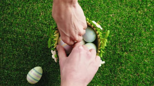 Easter Egg Nest Shared by Hands on Lawn