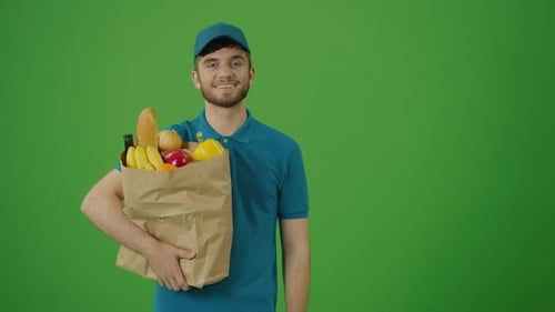 Green Screen Delivery Man Brings Paper Bag with Food
