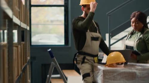 Warehouse Coworkers Managing Inventory