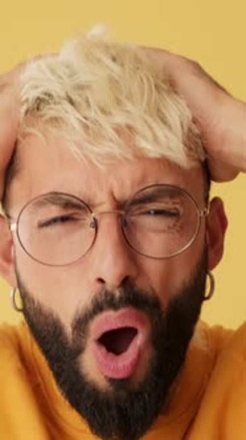 Man Reacting With Shock and Surprise