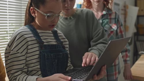 Little Classmates Using Laptop on Programming Lesson in Primary School