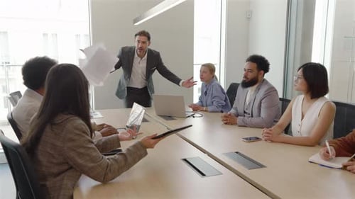 A Diverse Team Meeting Taking Place in the Corporate Office for Effective Collaboration