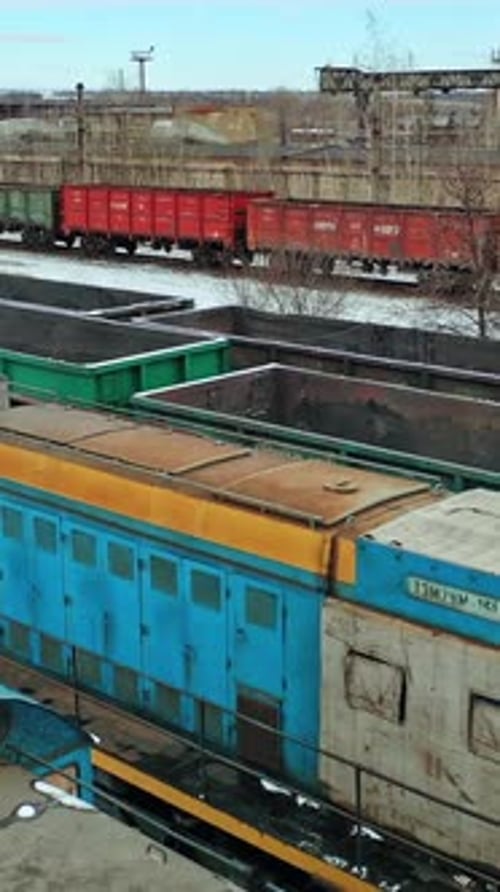 Container Freight Train On Station. Station with freight trains and containers in aerial view.