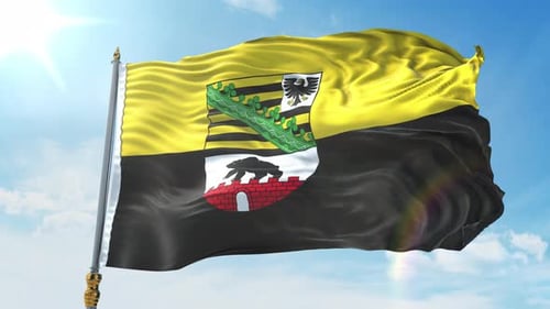 Realistic Waving Flag with Coat of Arms against Blue Sky