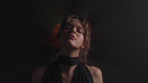 Beautiful Woman Posing with Dramatic Lighting