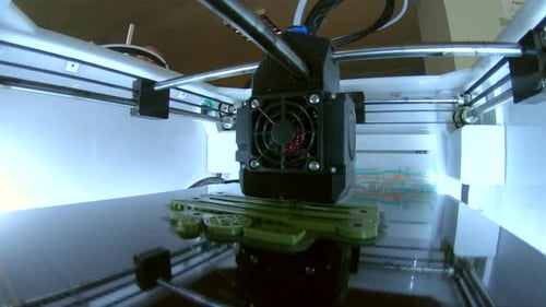 3D Printer Printing Prototype From Molten Plastic Process of Creating Model