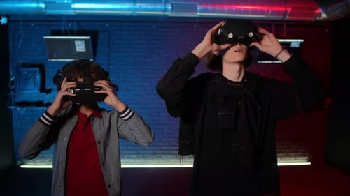 Young Adults Wearing Virtual Reality Headsets